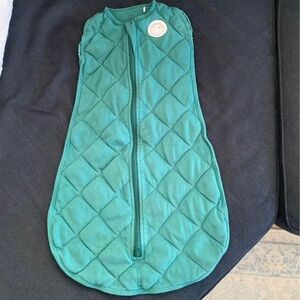 Dreamland Baby sleep swaddle and sleep sack..